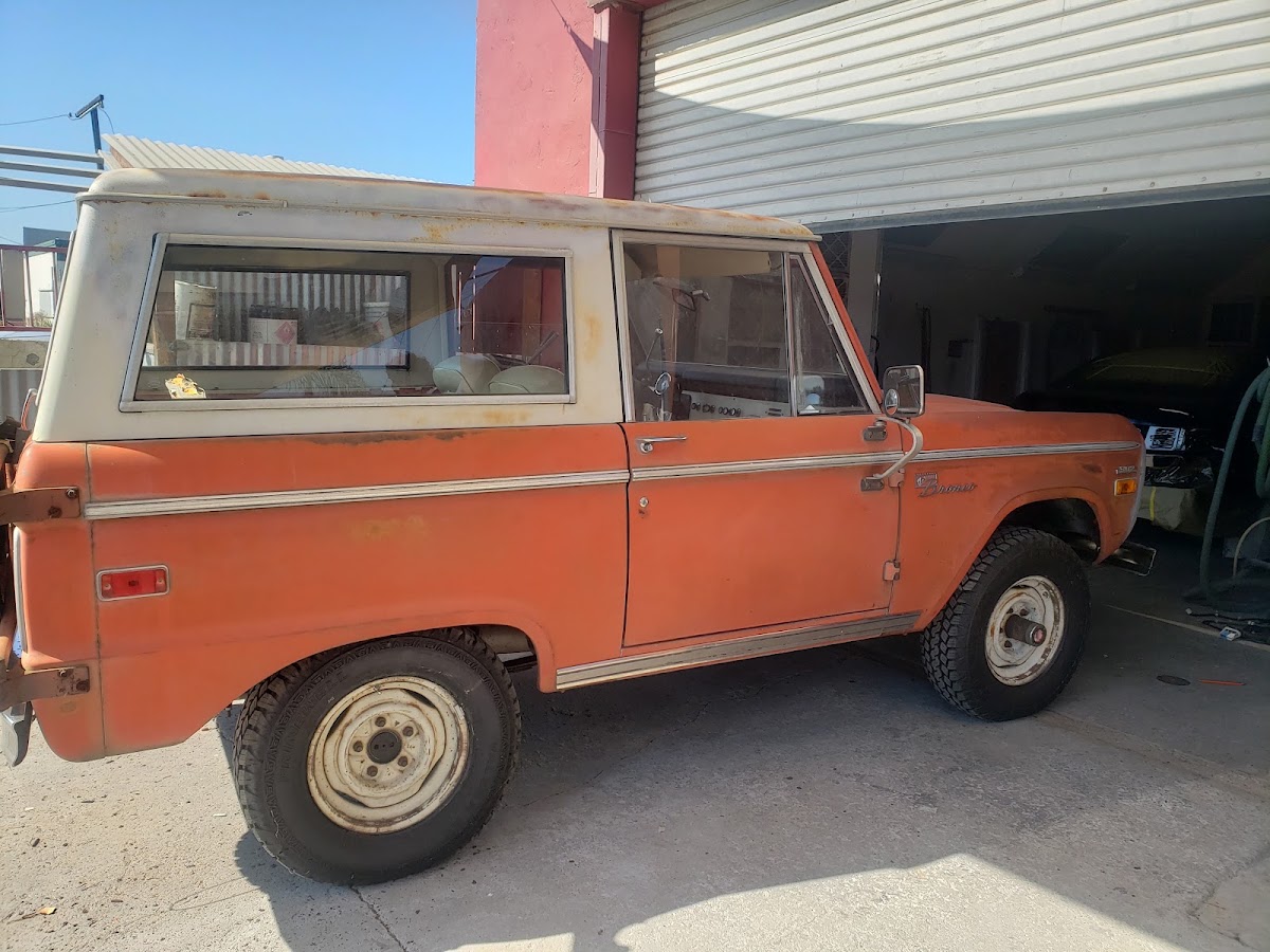 Classic Bronco in primer during body restoration